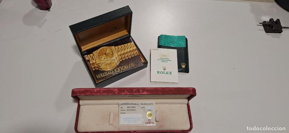 Recambios de relojes: Caja de Rolex con documentaci&oacute;n y caja Omega con tarjeta n.&ordm; de serie.