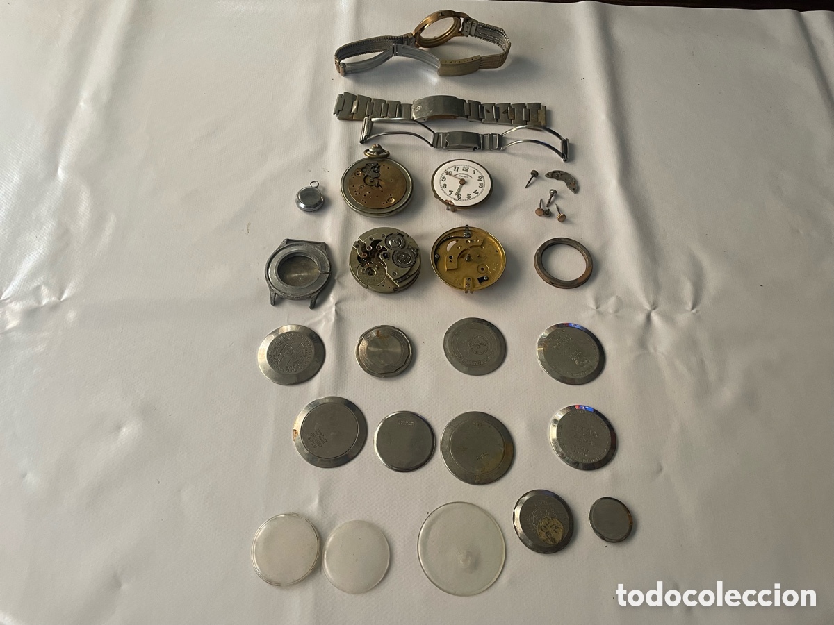 Recambios de relojes: Lote piezas sueltas de relojer&iacute;a: tapas, cajas, movimientos, correas, cristales