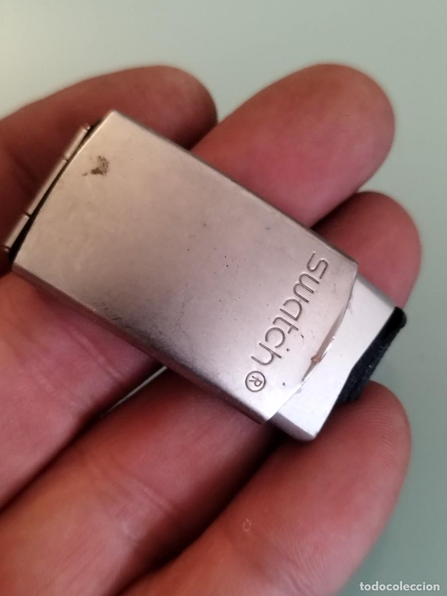Recambios de relojes: cierre o hebilla desplegable de acero inoxidable. Swathc. Irony?