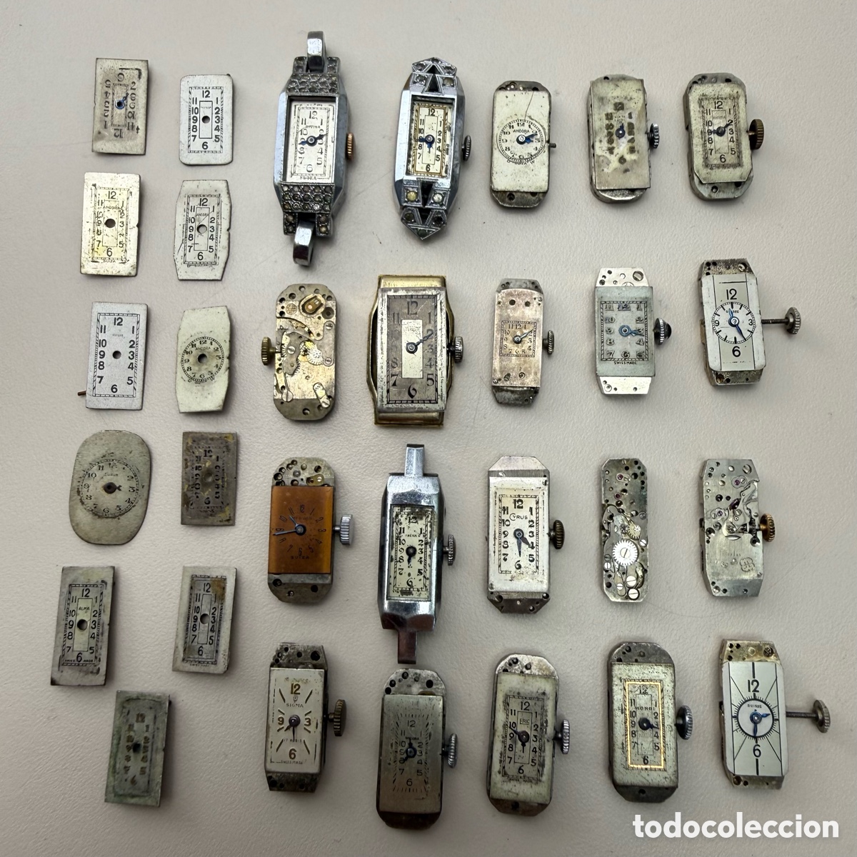 Recambios de relojes: Colecci&oacute;n 20 m&aacute;quinas de reloj rectangulares &eacute;poca deco y 11 esferas. Algunas funcionando.