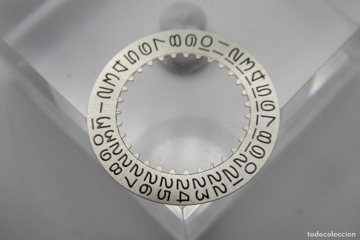 Recambios de relojes: Date indicator silver black numbers cal. 1570