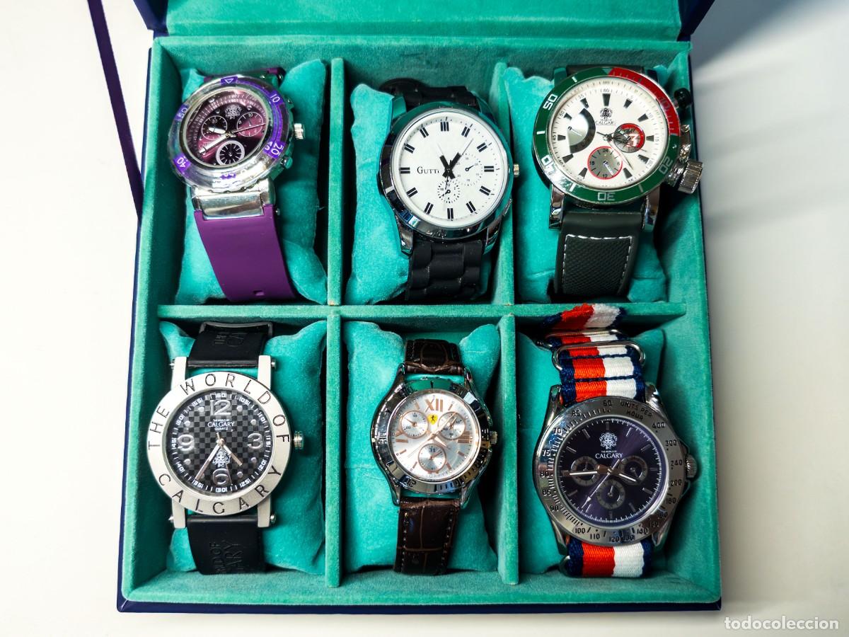 Recambios de relojes: Lote de 6 relojes de cuarzo con estuche expositor azul