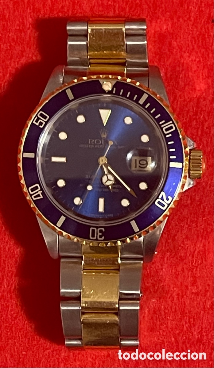 Relojes - Rolex: Reloj autom&aacute;tico, Rolex Submariner en acero y oro, y esfera color azul violeta.