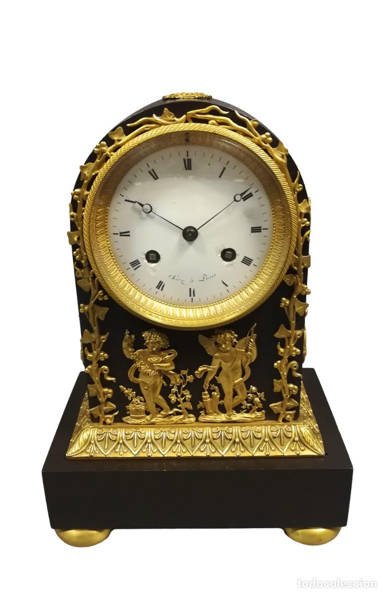 Horloges &agrave; remontage manuel: RELOJ IMPERIO BRONCE PAVONADO Y DORADO BASE MARMOL NEGRO SERIZE PARIS