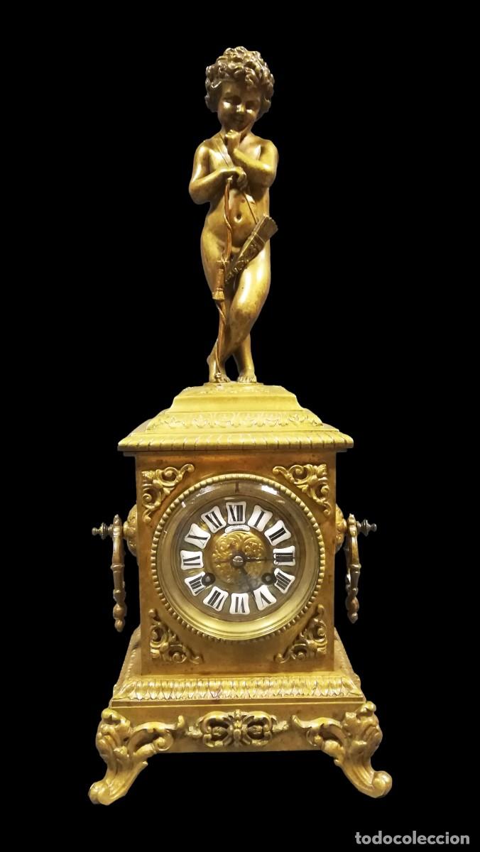 Horloges &agrave; remontage manuel: RELOJ DE BRONCE CON CUPIDO MAQUINA PARIS SELLO SAMUEL MARTI ET CIE