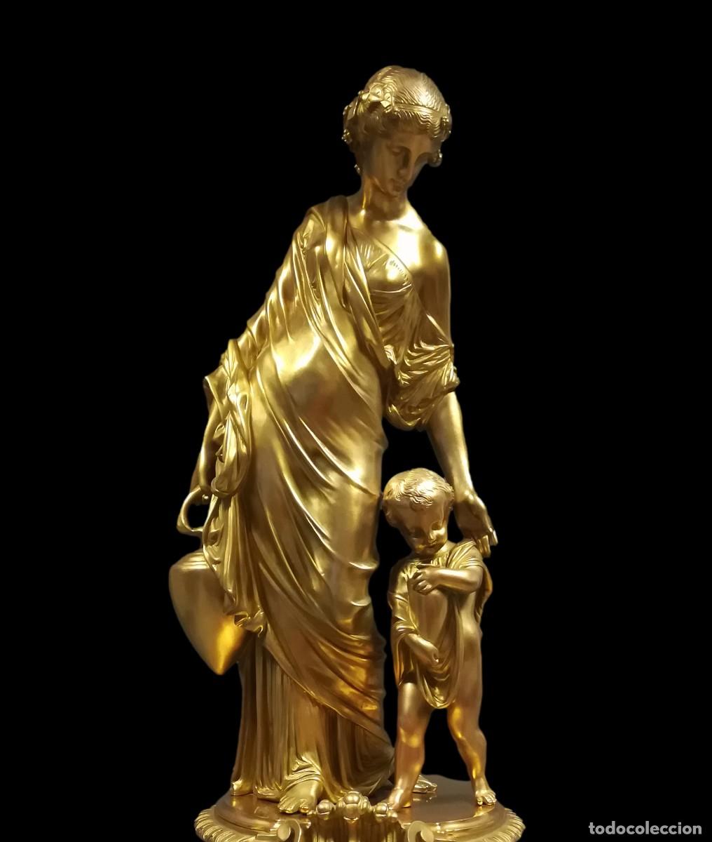 Horloges &agrave; remontage manuel: RELOJ BRONCE DORADO DAMA CON NI&Ntilde;O Y CANTARO