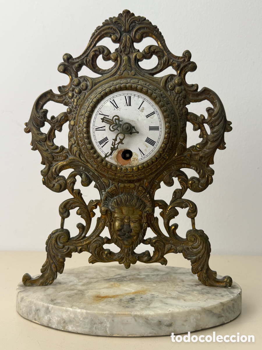 Orologi di carica manuale: Reloj sobremesa en bronce y base de m&aacute;rmol.