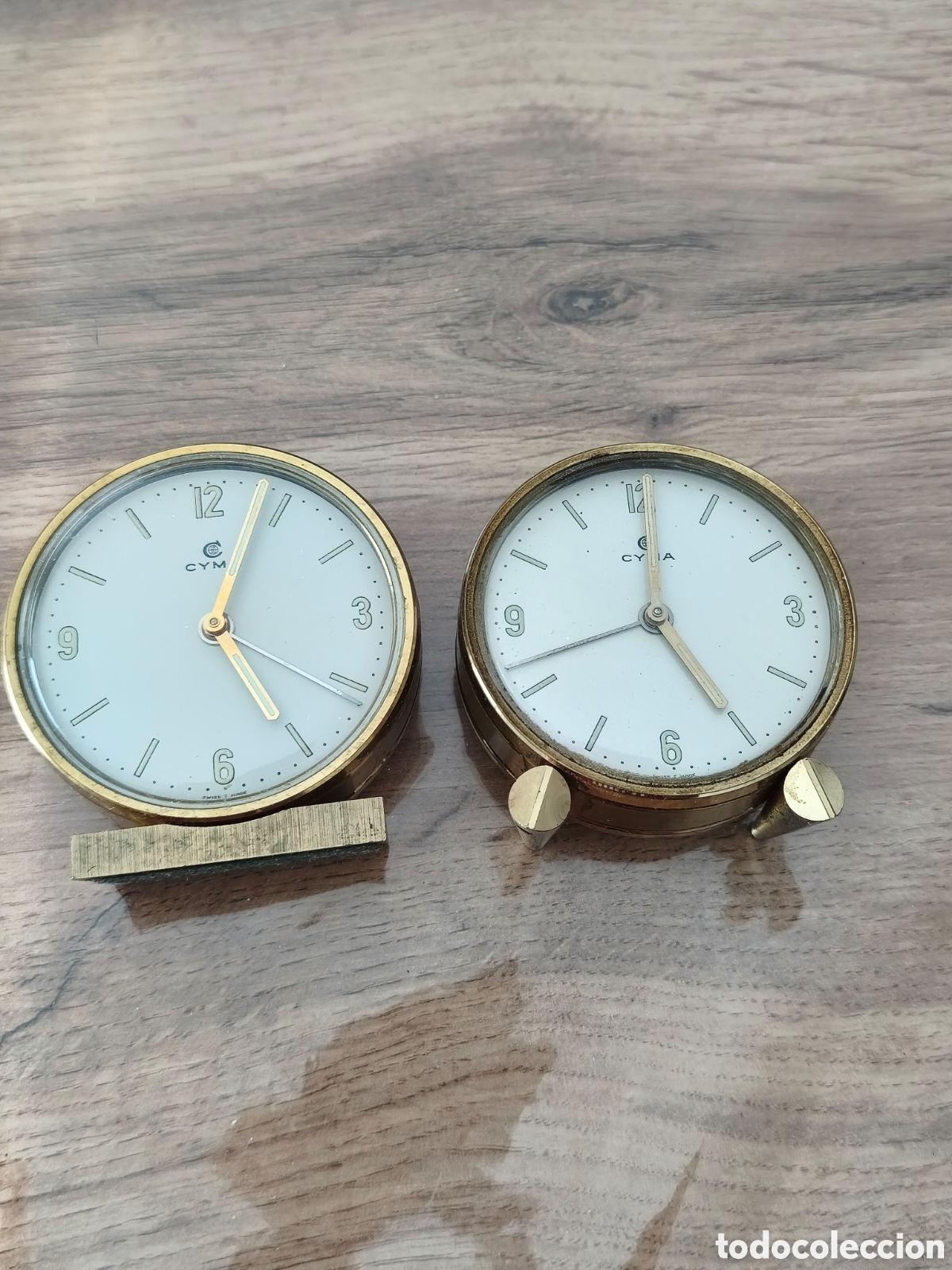 Relojes de carga manual: Lote 2 Antiguos Relojes Despertador Sobremesa CYMA Carga Manual S.XX Suiza
