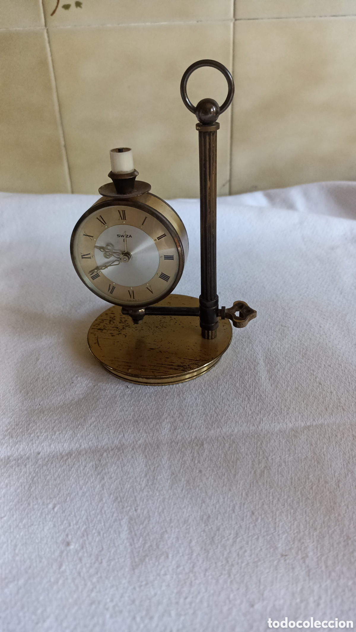 Relojes de carga manual: Reloj Despertador. Candelabro