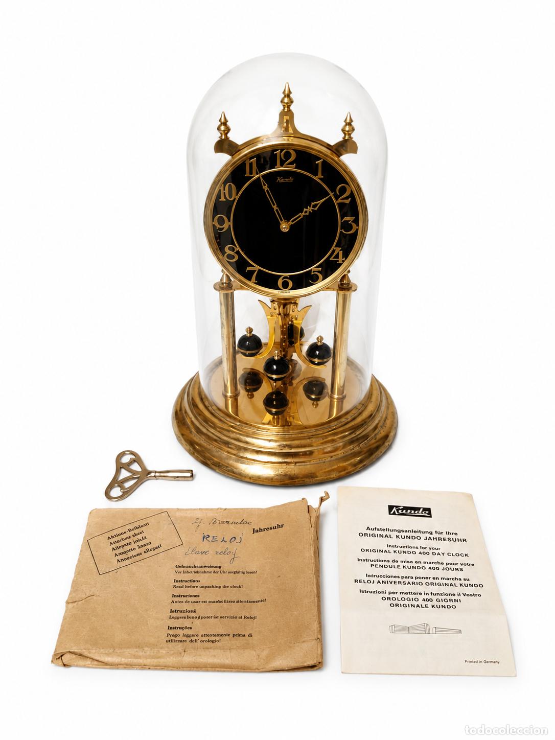 Relojes de carga manual: Reloj Aniversario de Torsi&oacute;n - Marca Kundo (Kieninger & Obergfell), Alemania - Instrucciones y Llave