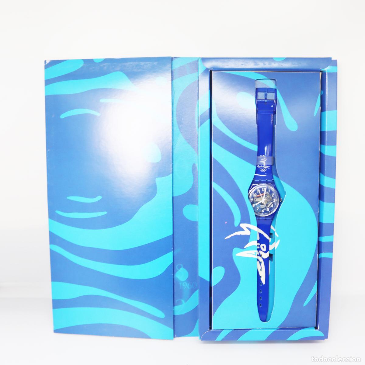Montres - Swatch: 2000 - SWATCH THE CLUB - GLORIOUS BLUE (SYDNEY OLYMPIC GAMES) - modelo GN182