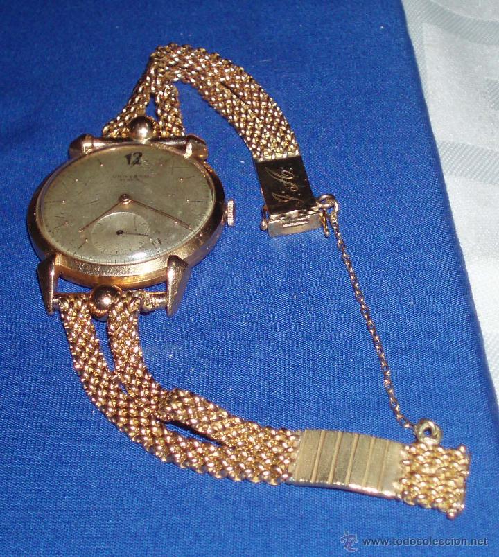 Relojes - Universal: reloj universal geneve de oro macizo y correa tambien de oro macizo de cuerda - Foto 1 - 48576223