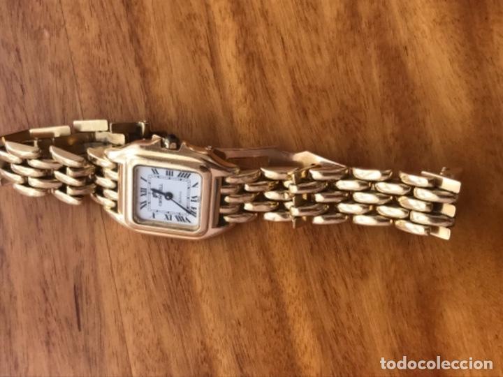Reloj oro 18k Cromwell mujer esfera nacarada azul bisel logo