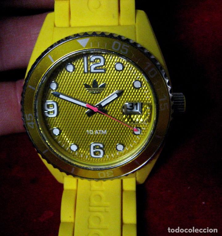 reloj adidas amarillo