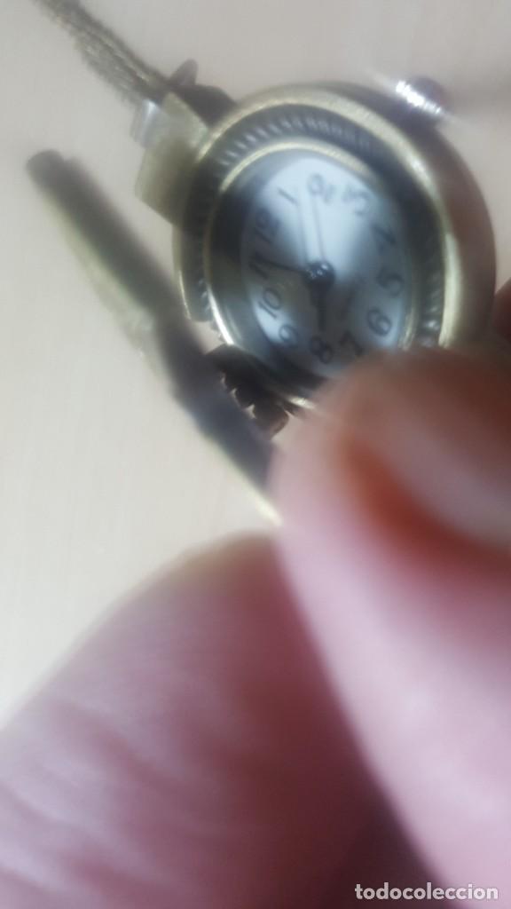 Relojes: CRUZ DE BRONCE ANTIGUO CON RELOJ. - Foto 2