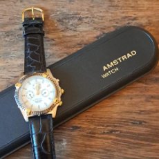 Relojes: RELOJ AMSTRAD STAINLESS STEEL BACK GOLD PLATED NUEVO CON ESTUCHE