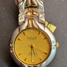 reloj llamativo omax en dos tonos. - Compra venta en todocoleccion