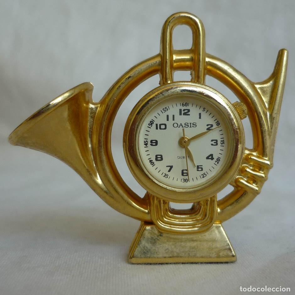 Relojes: Reloj de bronce en miniatura forma de corneta funcionando - Foto 1