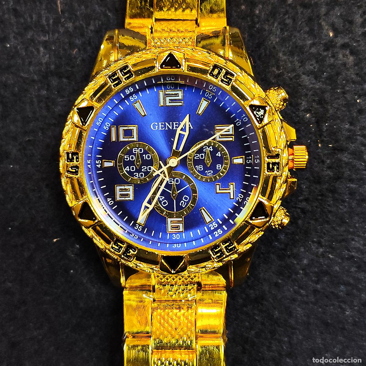 Watches: RELOJ DE ARMIS DE ACERO DORADO. MARCA GENEVA. ESFERA AZUL. QUARTZ