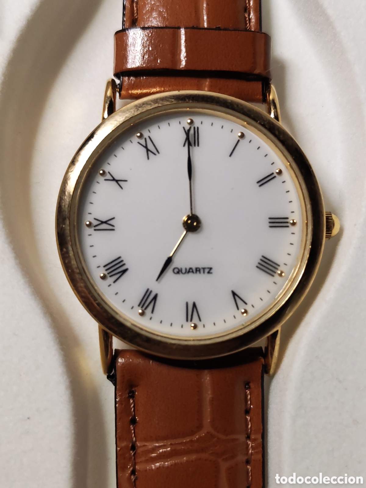 Relojes: Reloj Lotus con movimiento de cuarzo. Caja con respaldo acero inoxidable. Estuche original. (CL)