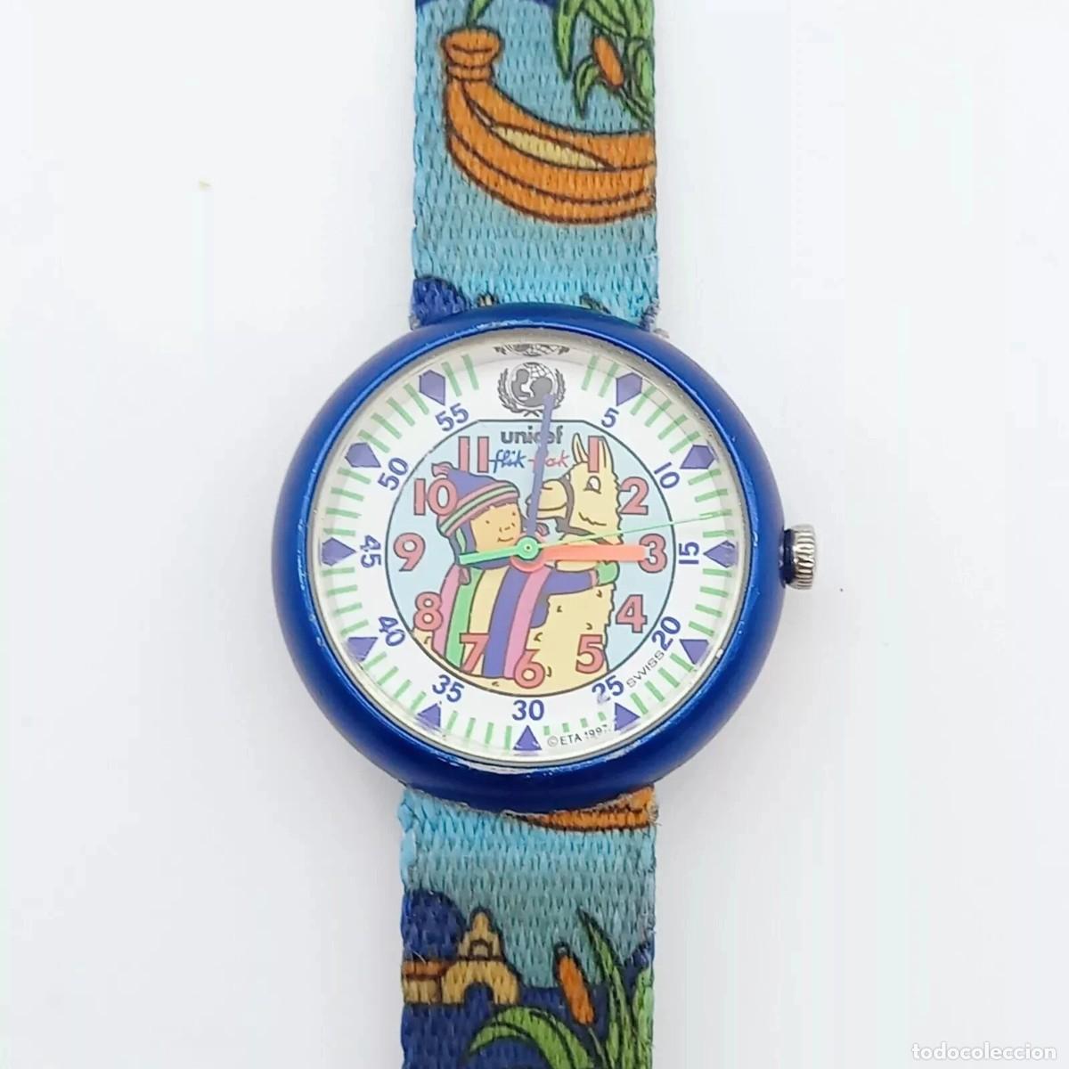 Watches: Reloj mu&ntilde;eca para nin&ntilde;os Flik Flak anal&oacute;gico original UNICEF 1998 color azul cesita pila nueva