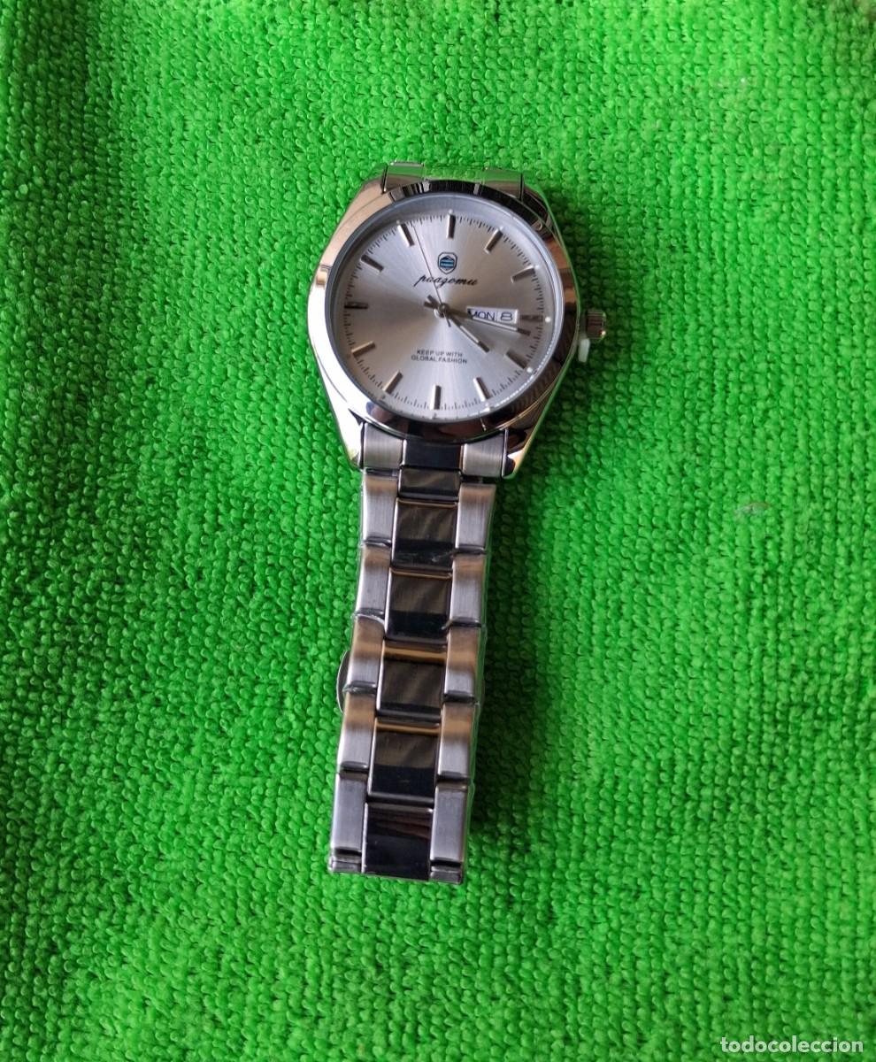 Relojes: Reloj a pila, nuevo a estrenar en su estuche