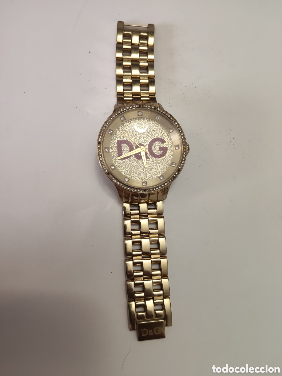 Montres: Reloj de pulsera Dolce y Gabbana original unisex dorado con brillantes