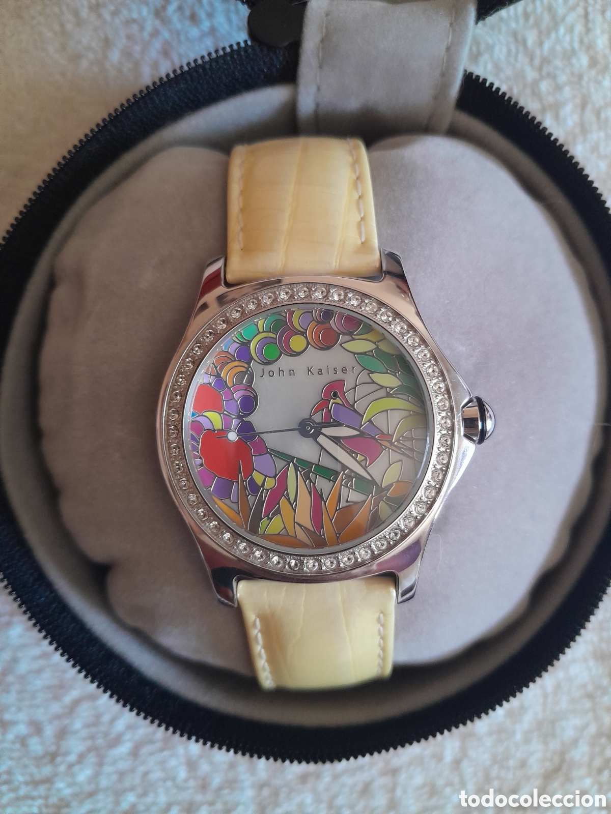Relojes: -Reloj de mujer John Kaiser.
