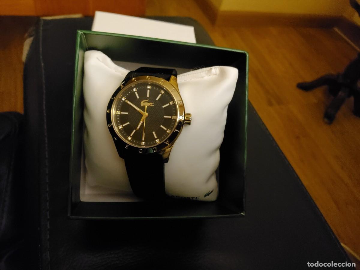 Rel&oacute;gios: Reloj lacoste negro y dorado