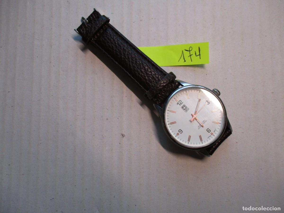 Relojes: RELOJ PULSERA WORLD TIME , ESFERA 3.5 CM BLANCA , BUEN ESTADO
