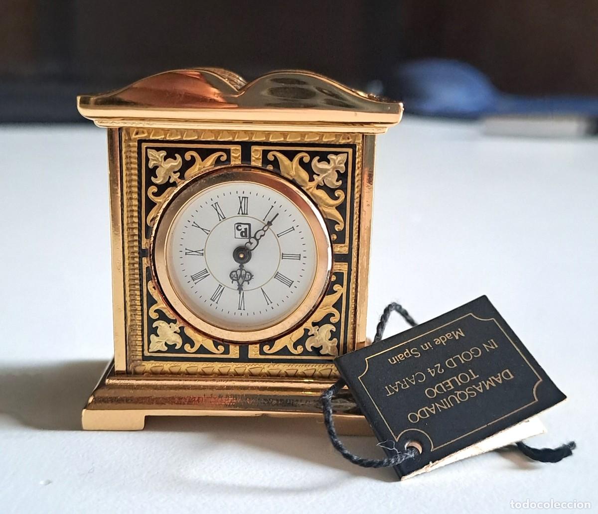 Relojes: MINI RELOJ DAMASQUINADO EN ACERO Y ORO 24KTS. TOLEDO. ICLUYE GARANTIA