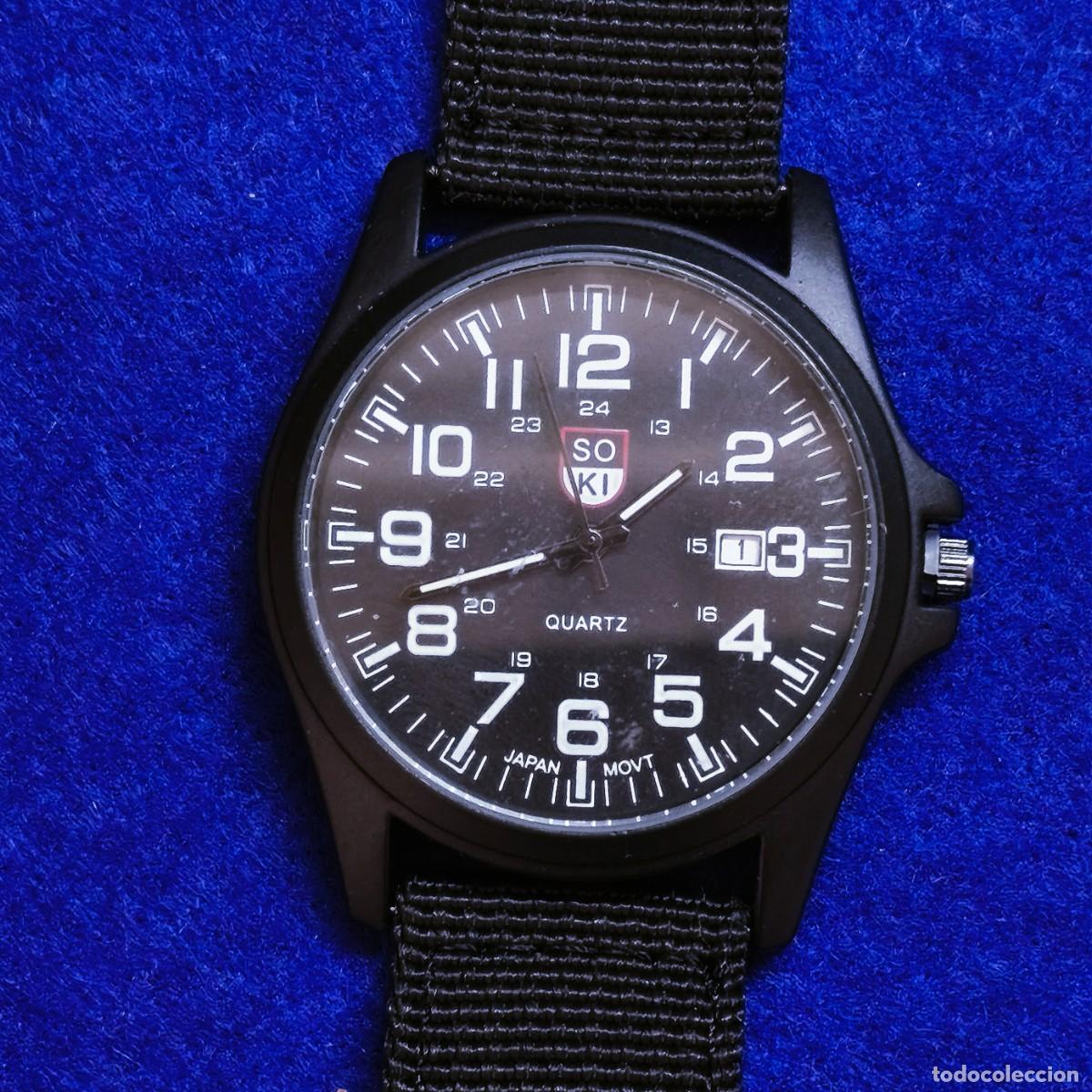 Montres: RELOJ DE CORREA FIBRA NEGRA. MARCA. ESFERA NEGRA. FECHA. QUARTZ