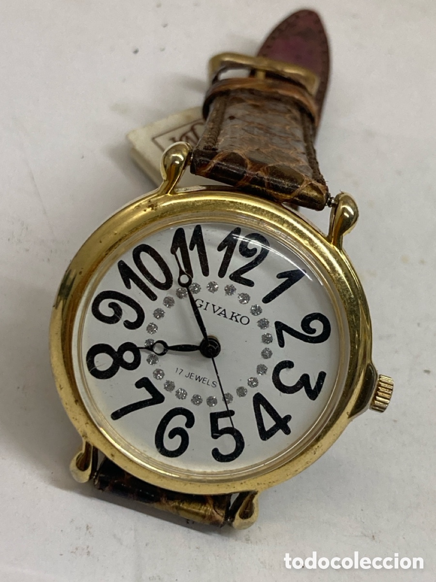 Relojes: Reloj Givako carga manual dorado