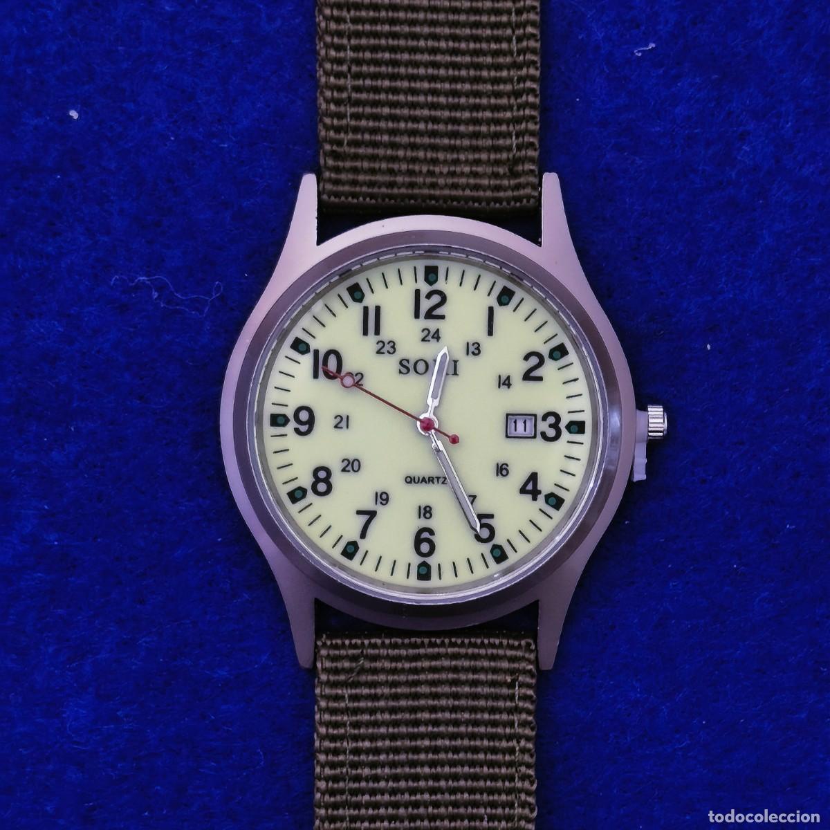 Montres: RELOJ DE CORREA FIBRA VERDE Y ALUMINIO?. MARCA. ESFERA AMARILLA. FECHA. QUARTZ