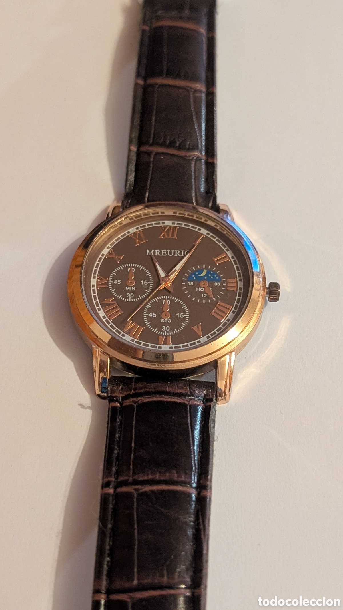 Relojes: Reloj de pulsera marr&oacute;n y dorado