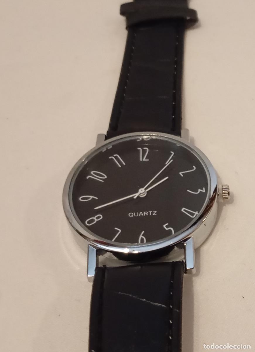 Relojes: Reloj anal&oacute;gico de cuarzo de estilo minimalista con esfera negra
