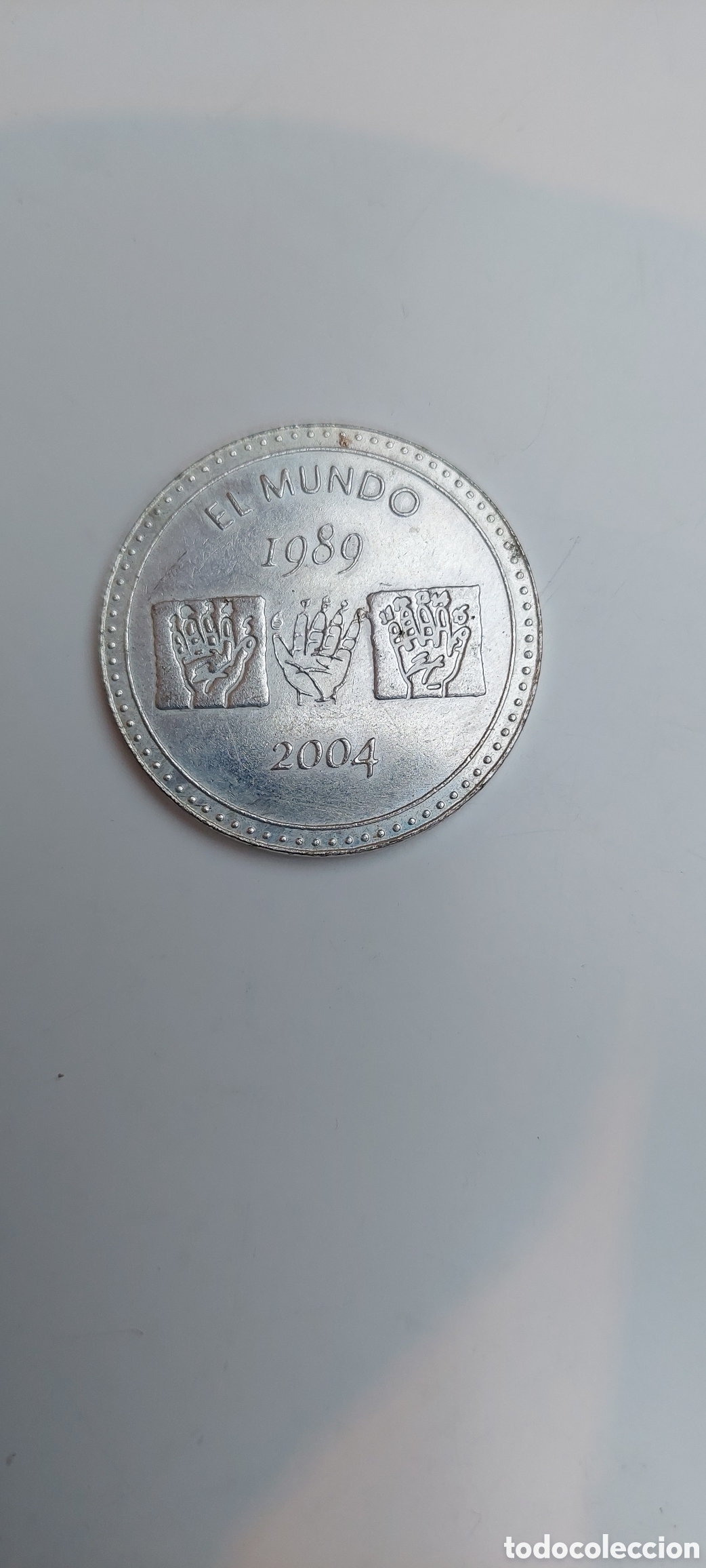 Reproducciones billetes y monedas: Moneda El Mundo 1989 - Foto 1