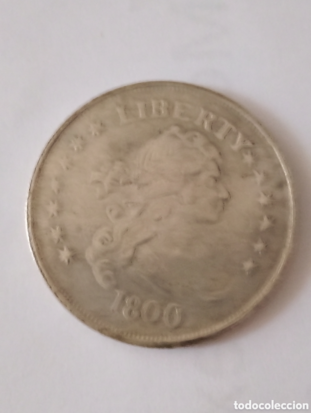 Reproducciones billetes y monedas: 5 monedas falsas de Am&eacute;rica y holandesas