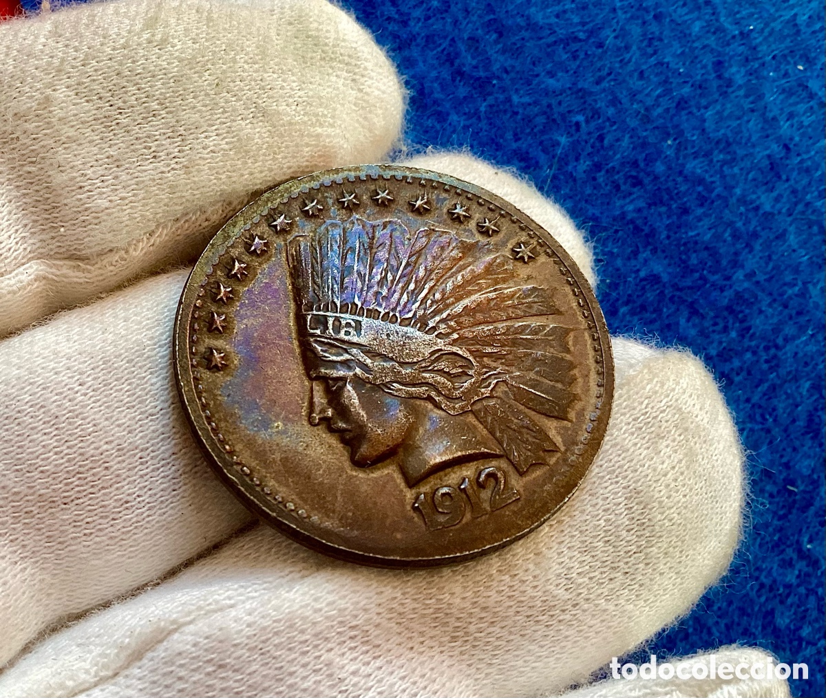 Reproducciones billetes y monedas: Raro token de Disney. &ldquo;Miners Bank 1912&rdquo; cabeza de indio nativo. Bronce