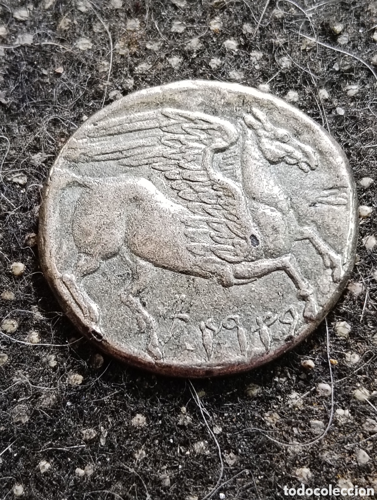 Reproducciones billetes y monedas: R&eacute;plica de un Decadracma de una moneda antigua de Cartago que muestra a Pegaso en el reverso.