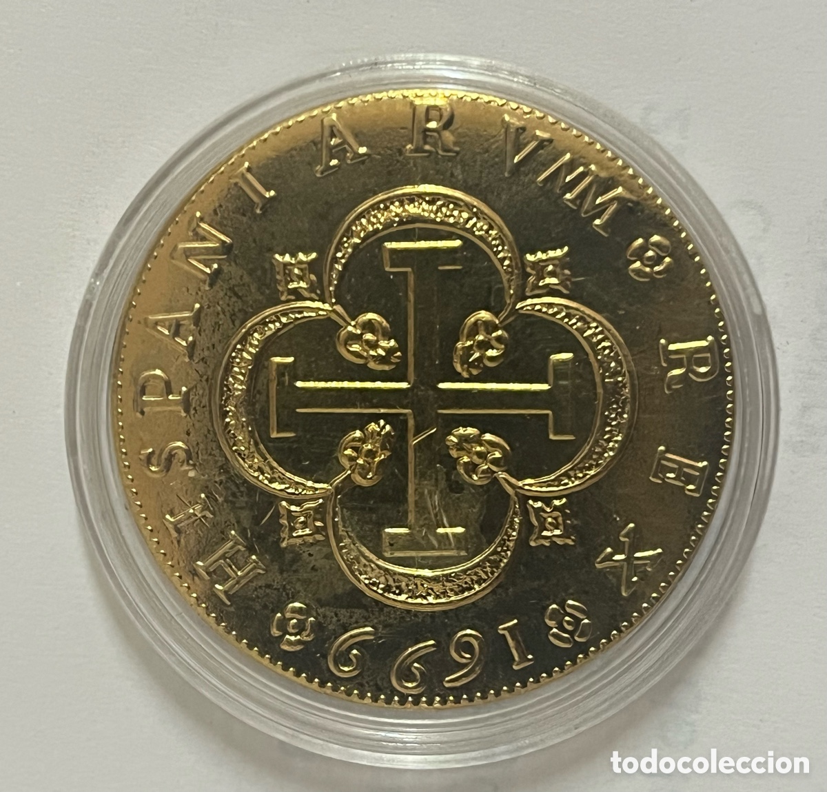 Reproducciones billetes y monedas: Moneda de oro puro 8 escudos 1699
