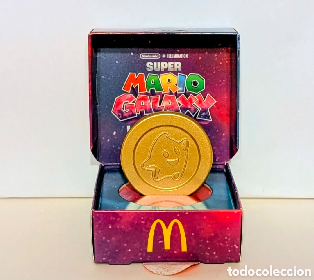 Reproducciones billetes y monedas: Exclusiva moneda de colecci&oacute;n Super Mario Bros Galaxy. La pel&iacute;cula. Nintendo. Mc Donald's