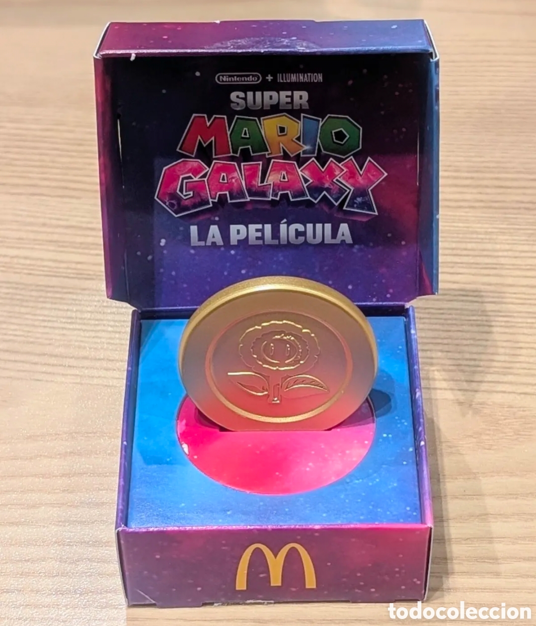 Reproducciones billetes y monedas: Exclusiva moneda de colecci&oacute;n Super Mario Bros Galaxy. La pel&iacute;cula. Nintendo. Mc Donald's