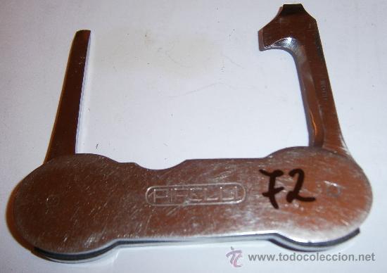 Coches y motocicletas: Herramienta PIRELLI, de 7,5 cms - Foto 2