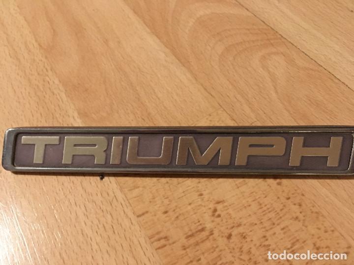 Automobili e Motociclette: placa Triumph