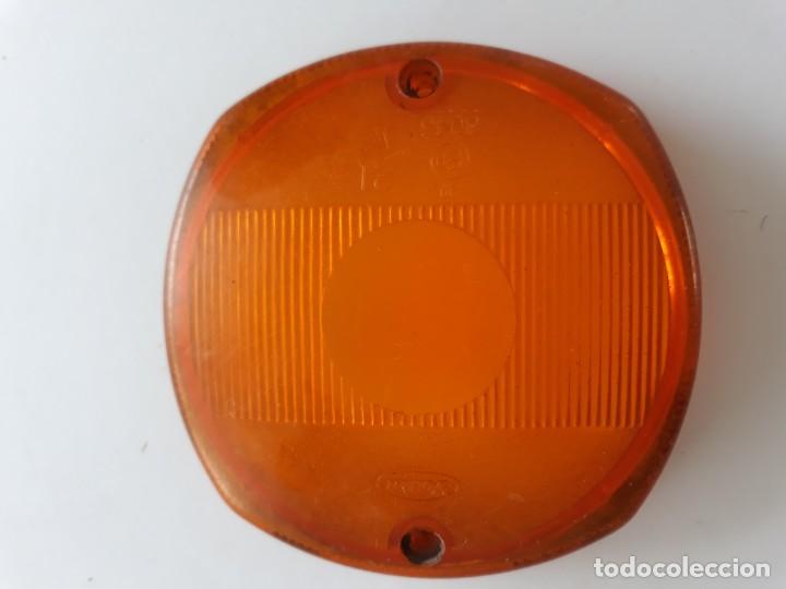 Automobili e Motociclette: Piloto naranja  redondo