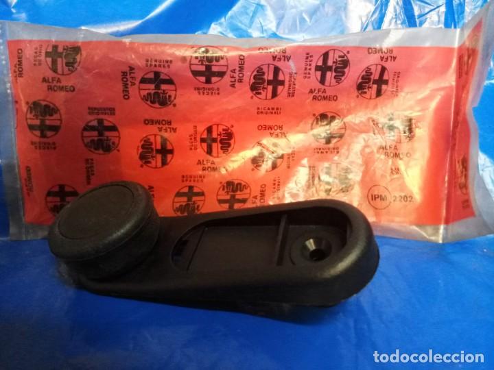 Autos und Motorr&auml;der: maneta alzacristales -Alfa Romeo