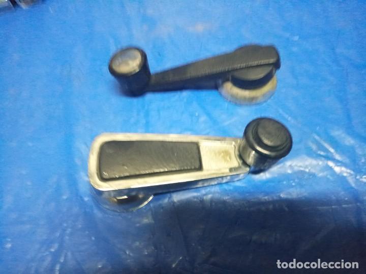 Autos und Motorr&auml;der: Maneta alzacristales Seat