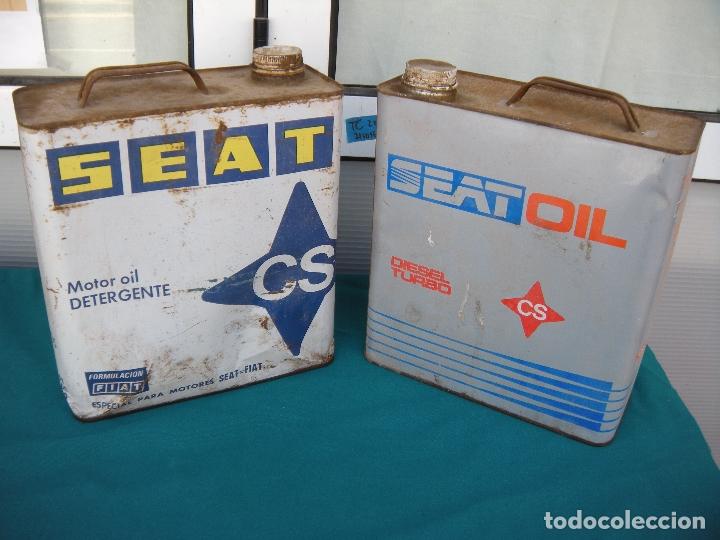Autos und Motorr&auml;der: LATAS DE ACEITE COCHE SEAT