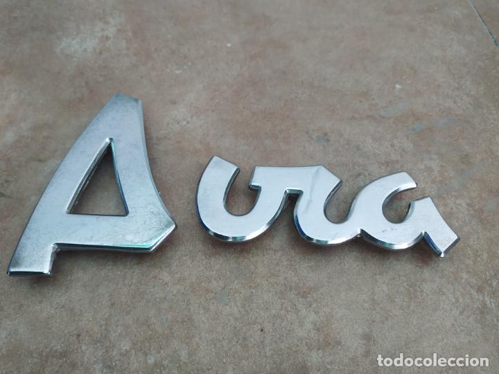 Autos und Motorr&auml;der: CONJUNTO DE LETRAS CROMADAS DE LOGOTIPO AVIA. FALTA EL PUNTO DE LA I.